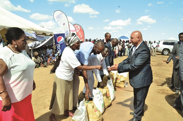 Cde Raj Modi handing over foodstuffs to Bulawayo residents