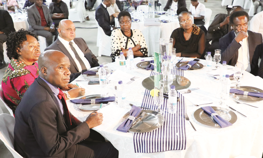Deputy Minister of Industry and Commerce Cde Raj Modi (third from left), Minister of State for Bulawayo Metropolitan Province, Cde Judith Ncube (centre), Cde Elifas Mashaba (far right) and officials from the Ministry of Industry and Commerce follow proceedings during a business forum in Bulawayo last night